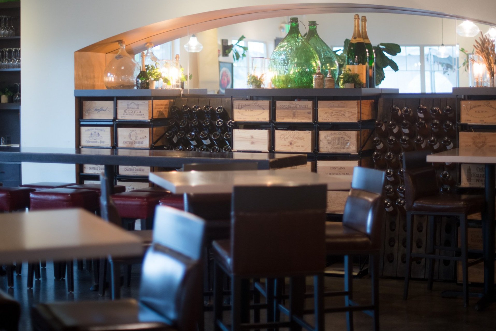 The dining room and bar at Morso, with wine-crate shelving
