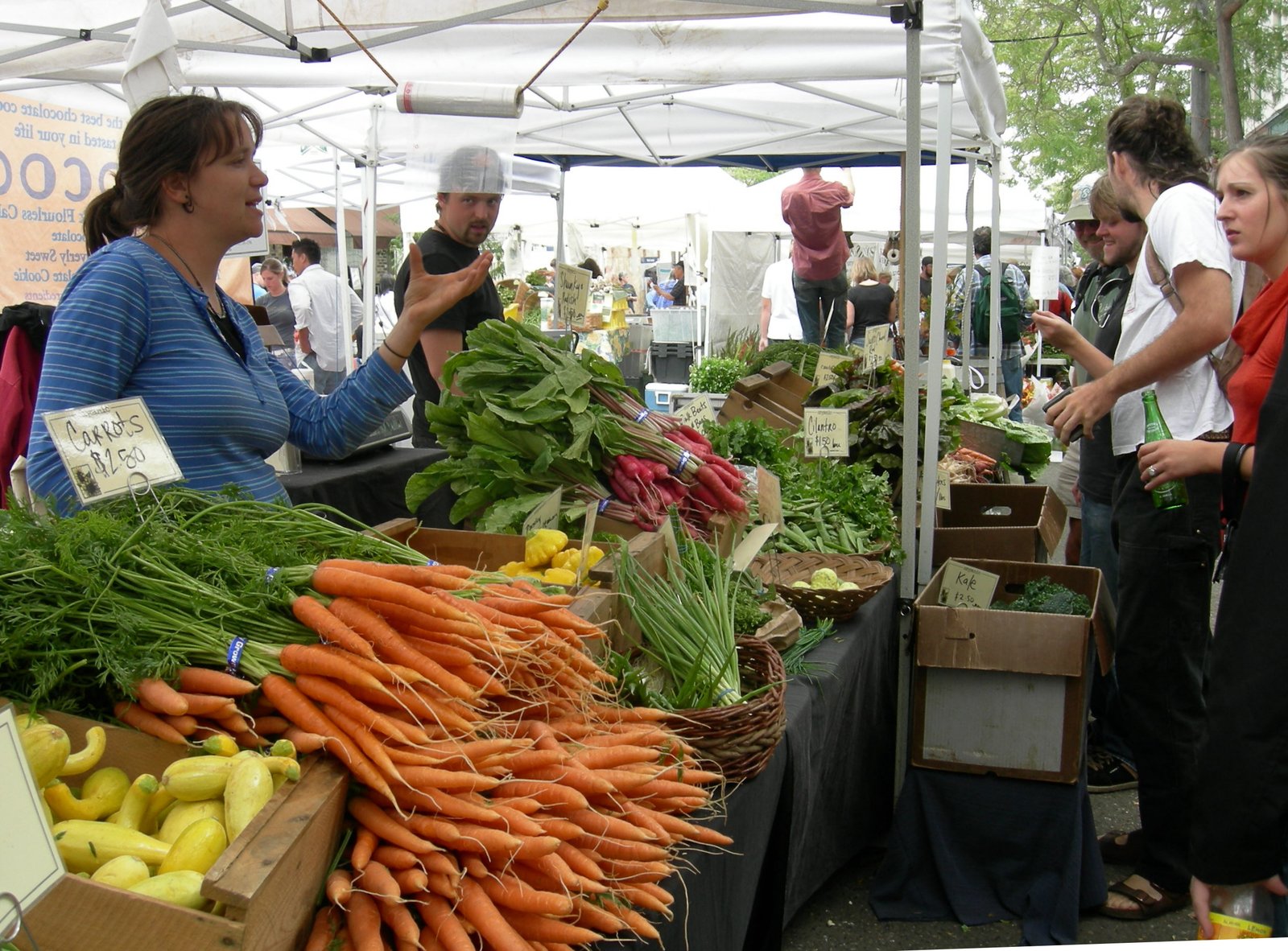 A market stall piled high with fresh produce