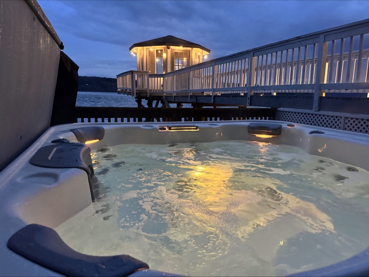 Steam rising from the hot tub at dusk